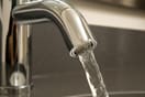 Save on Any Well Pump Replacement Water flowing from tap